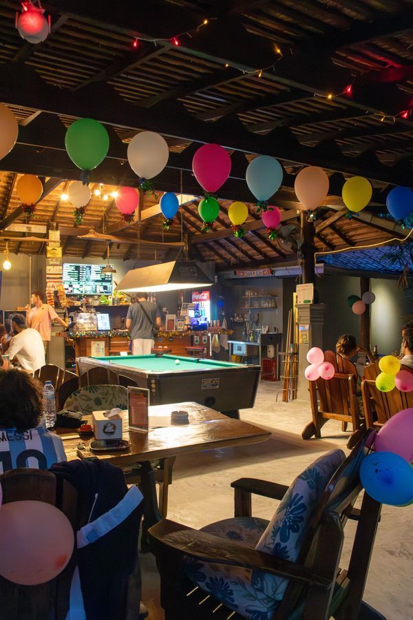 Celebration with balloons inside Magical Garden cannabis lounge, Ko Samui