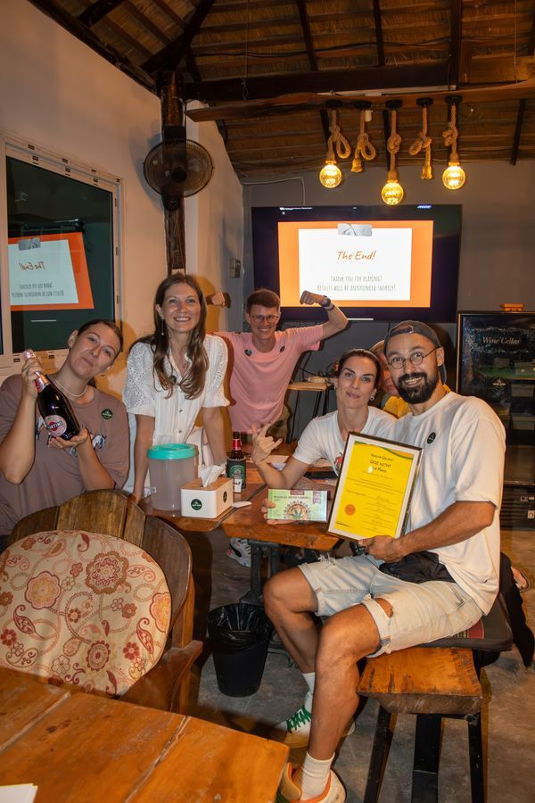 Group celebrating in the dining lounge of MG Bistro, Ko Samui