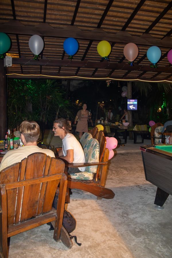 Fun outdoor seating area with balloons at MG Bistro, Ko Samui